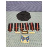 Assorted military shoulder boards, cap, lapel
