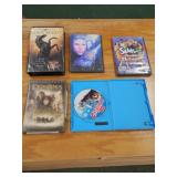 5 assorted DVD, VHS, PC movies and games - black