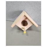 Custom-made solid wood birdhouse