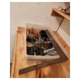 Storage tote of assorted tools Storage tote of assorted tools
