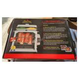 Showtime rotisserie and barbecue, new in box Showtime rotisserie and barbecue, new in box