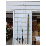 Assorted fishing poles and rod holder Assorted fishing poles and rod holder