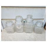 4 glass storage canisters 4 glass storage canisters