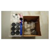 Assorted glass and plastic storage bottles Assorted glass and plastic storage bottles