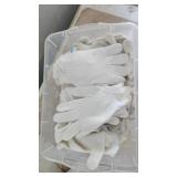 Storage tote of cotton work gloves Storage tote of cotton work gloves