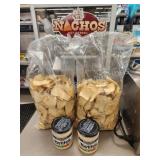 2 large bags nacho chips and 2 Tostitos Queso