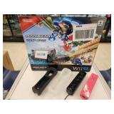 Nintendo Wii U gaming system with controllers,
