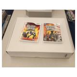 Wii Guitar Hero guitar and 2 games