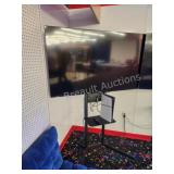 Element Roku 58 in flat screen TV with rolling TV