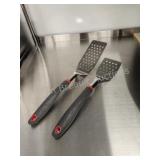 2 large stainless steel spatulas