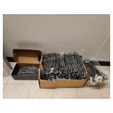 Huge assortment pegboard pegs and hooks, must