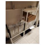 Plastic storage shelving units with contents,