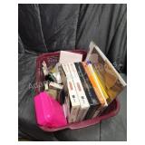 Laundry basket of assorted office supplies