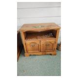 Oak 2-door cabinet, top has water damage, see pics