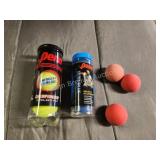 6 racquetballs and 2 tennis balls
