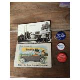 Assorted vintage postcards and political pins