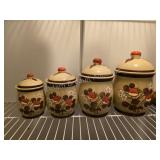 Vintage ceramic canisters with a mid-century