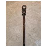 Hand-carved 36 in African walking can, likely