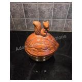 Vintage squirrel-on-walnut ceramic dish marked
