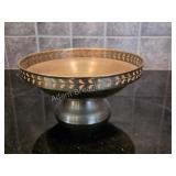 Vintage brass pedestal bowl featuring a