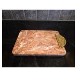 Decorative natural stone cutting board, likely