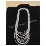 Express Elegant Multi Strand Silver Tone Liquid