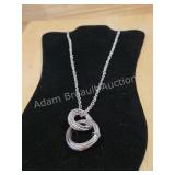 Silver Tone Interlocking Textured Ring Pendant