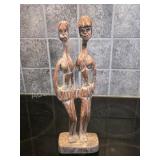 Unique wooden hand-carved figurine, likely