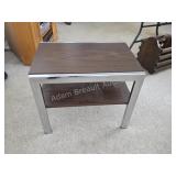 MCM side table, it features a striking