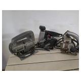 Plastic milk crate with three vintage jigsaws.