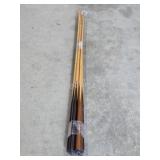 Assorted pool cues and bridge