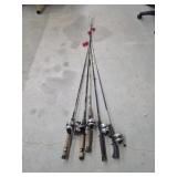 Five assorted fishing poles with Zebco 33 reels