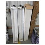 Three lights of America 4 ft shop light fixtures,