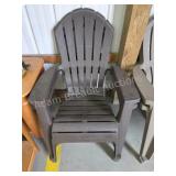 Two plastic molded stackable Adirondack chairs,