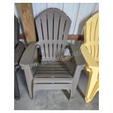 Two plastic molded stackable Adirondack chairs,