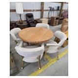 Oak 42-in round table with 18-in leaf and four