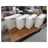 Four plastic wall mount fold out storage drawers,