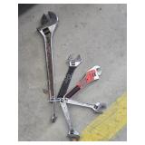 Six assorted adjustable wrenches