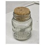 Vintage vaseline glass jar with stopper,