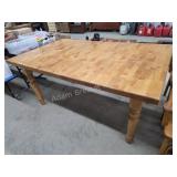 Butcher block top dining table with two leaves,