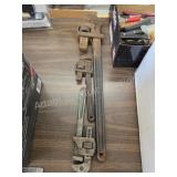 Three assorted vintage pipe wrenches