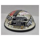Women's motorcycle helmet with humorous stickers,
