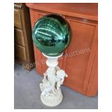 Modern cherub resin gazing ball and stand, approx