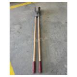 Hardwood handle post hole diggers
