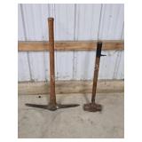 Vintage pickaxe and sledgehammer