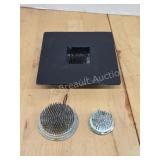 Three vintage metal flower frogs