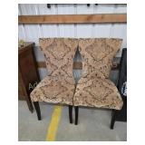 Two modern upholstered parsons-style dining