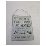 Warm beer cold food bad service welcome have a