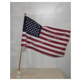American flag with wood pull and plastic mounting
