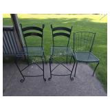 2 Black wrought iron high top bar stools and
